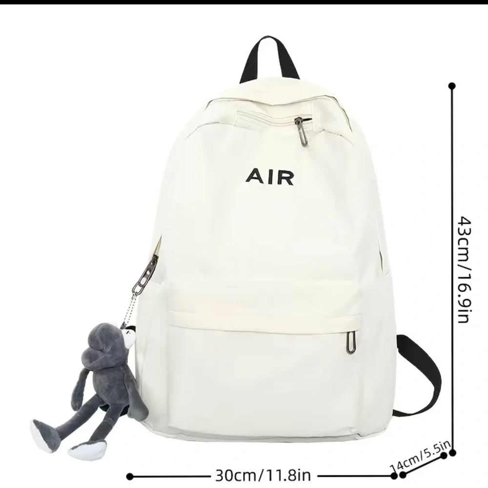 Black Book bag. Chic. Large capacity. Inspired by Bauhaus architecture .Backpack